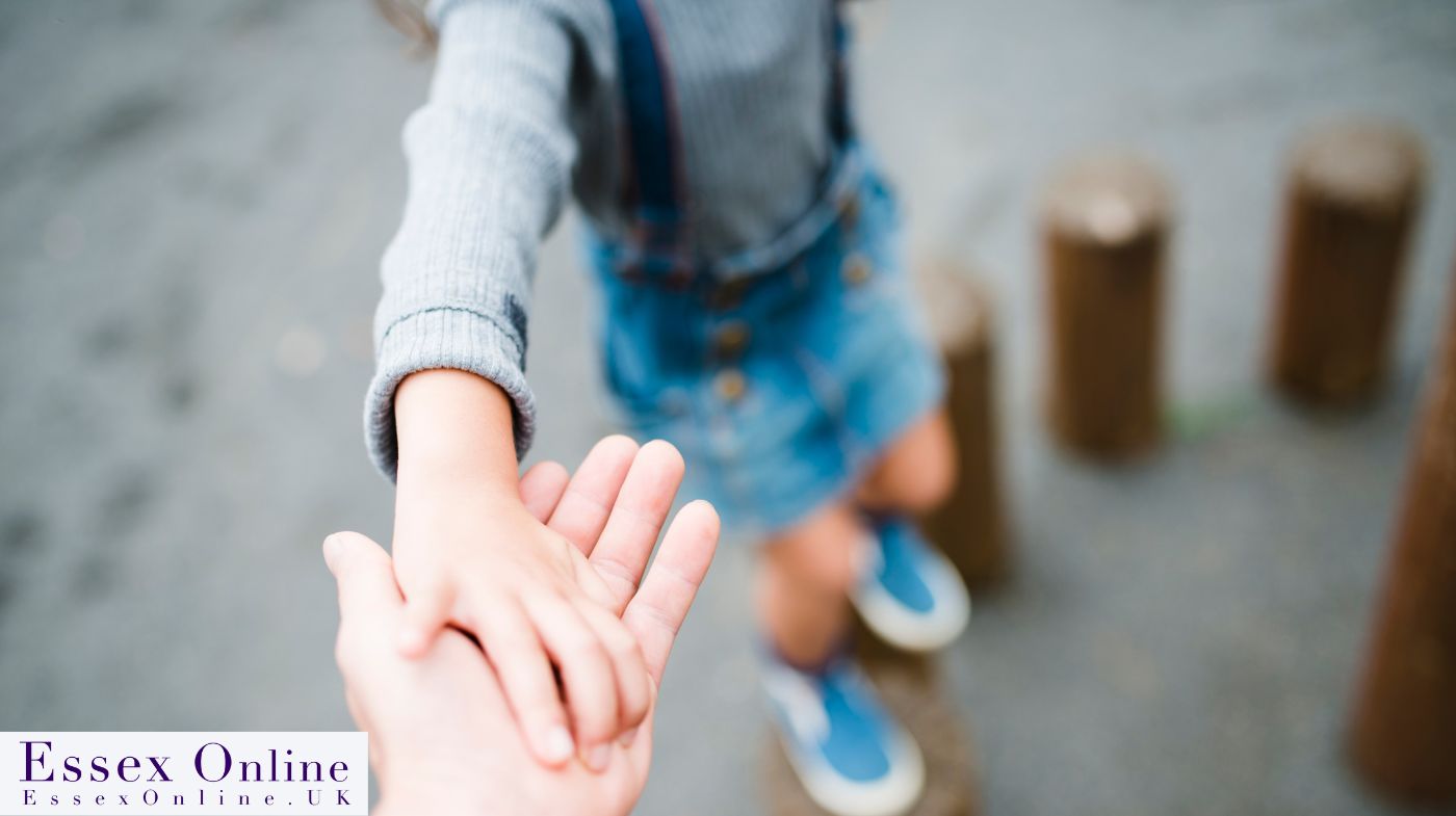 child holding hand